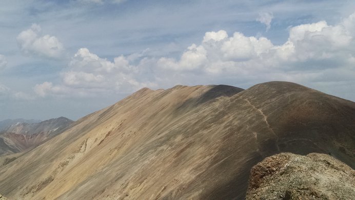 The trail back to Redcloud Peak is visible on the ridge from Sunshine Peak