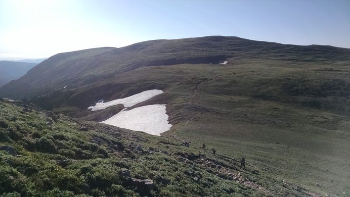 Backpackers ascend the High Lonesome Trail from Rollins Pass.